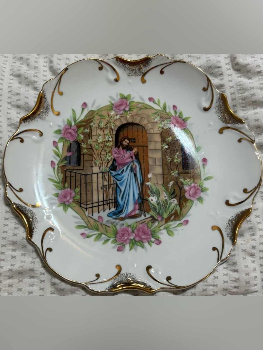 Porcelain Decorative Plate with Pink Floral Motif and Religious Scene